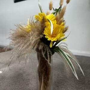 Yellow and Tan Floral Arrangement in Glass Vase